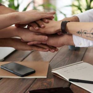 Group hands together